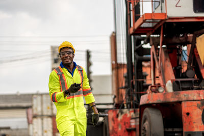 Portrait of man working at bus