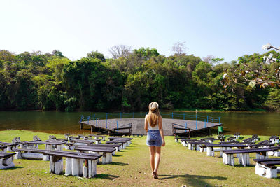 Back view of young woman in goiania park, goias, brazil