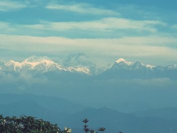 Scenic view of snowcapped mountains against sky