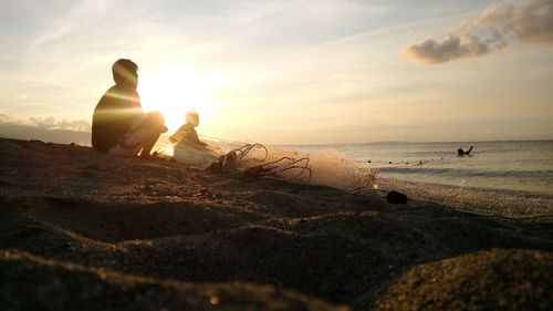 Scenic view of sea at sunset