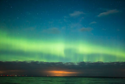 Scenic view of sea against sky at night