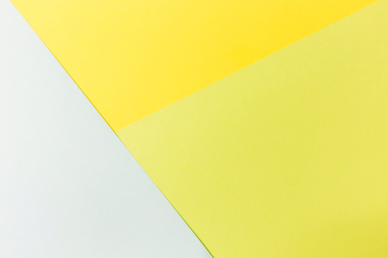 FULL FRAME SHOT OF YELLOW PAPER