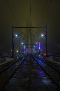 Illuminated railroad station at night