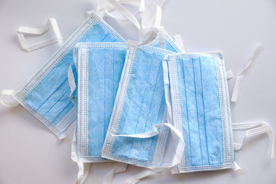 Close-up of clothes hanging over white background