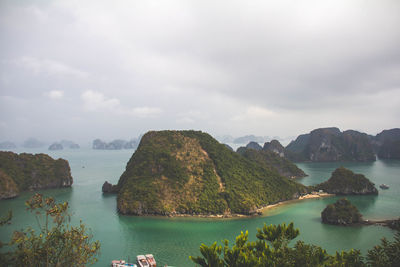 Scenic view of sea against cloudy sky