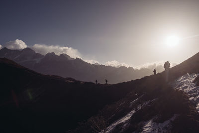 Scenic view of silhouette mountains against sky