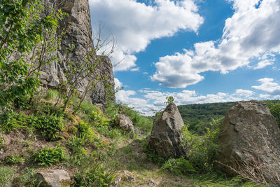 Rock formation on land against sky