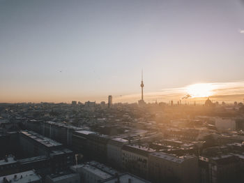 High angle view of city buildings during sunset