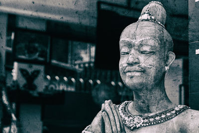 Close-up portrait of buddha statue