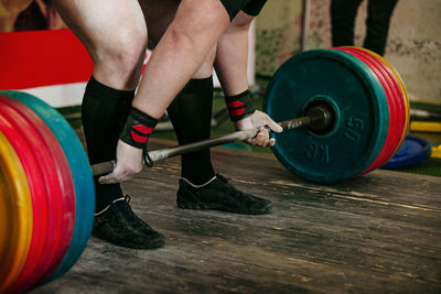 Athlete exercise deadlift barbell weighing 300 kg