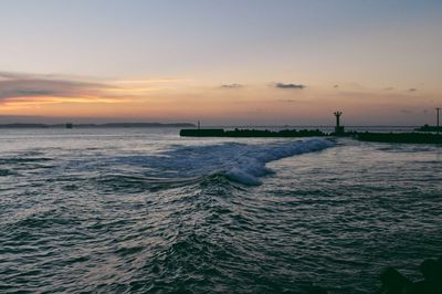 Scenic view of sea against sky during sunset