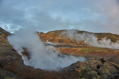 Smoke emitting from volcanic mountain