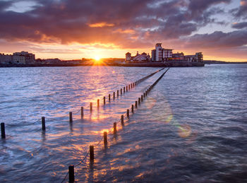 Scenic view of sea against sky during sunset