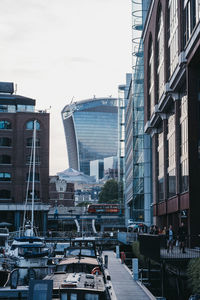 Modern buildings in city against sky