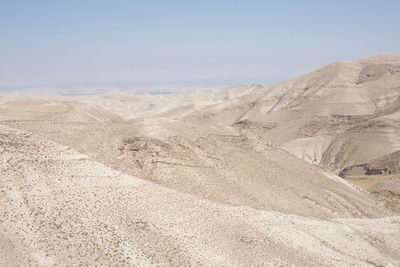 Scenic view of desert against clear sky