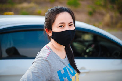 Portrait of a woman in car