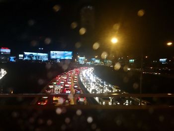 Cars on street at night