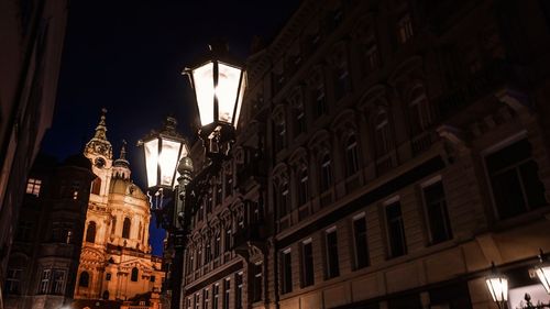 Low angle view of illuminated building at night