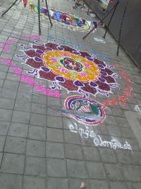 High angle view of multi colored umbrella on street