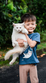 Portrait of cute boy outdoors