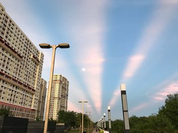 Low angle view of buildings in city against sky