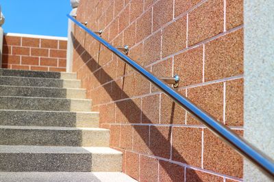 Shadow of staircase on building wall