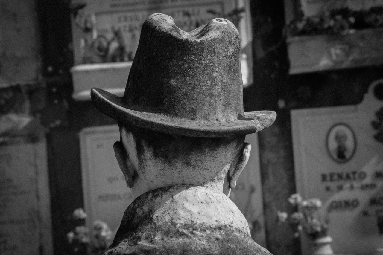 focus on foreground, close-up, old, no people, day, architecture, indoors, communication, still life, text, craft, store, run-down, built structure, hat, stone material, weathered, metal