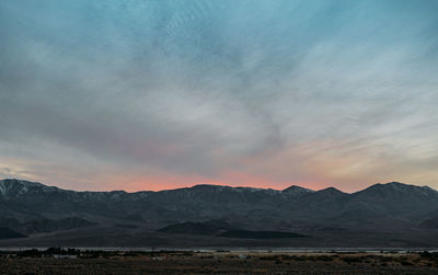 Scenic view of mountains against sky during sunset