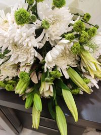 High angle view of fresh white flowers on table
