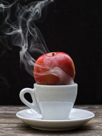 Close-up of coffee cup on table