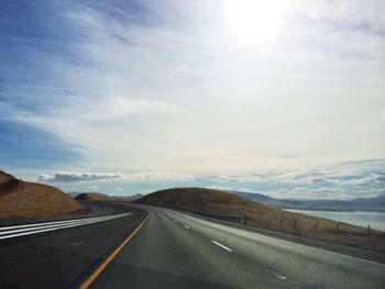 Road leading towards mountains