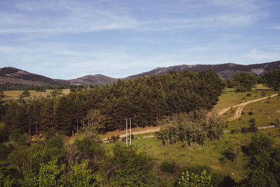 View of landscape against cloudy sky