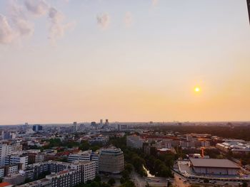 High angle view of townscape against sky during sunset