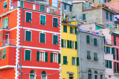 Low angle view of multi colored buildings in city