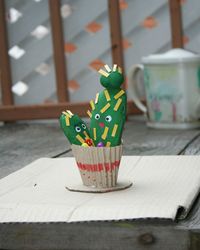 Close-up of multi colored paper on table at home