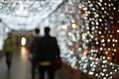 Defocused image of illuminated lights at night