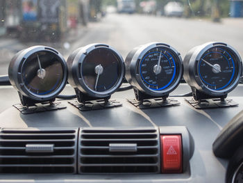 Close-up of gauges in car