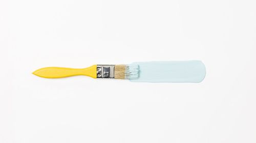 High angle view of tools against white background