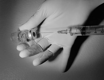 Close-up of hand holding ring