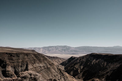 Scenic view of mountains against clear sky