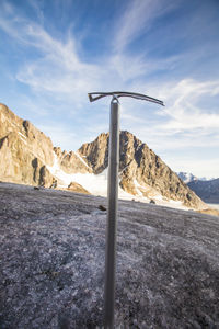 Mountaineering ice axe in glacier, baffin island