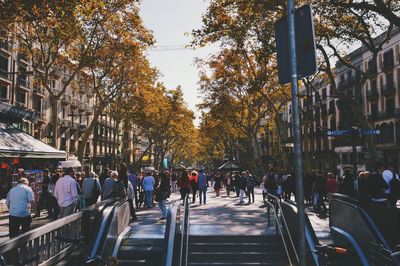 People walking on city street