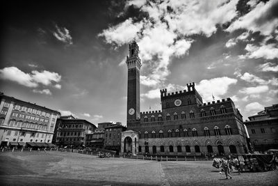 View of clock tower against cloudy sky