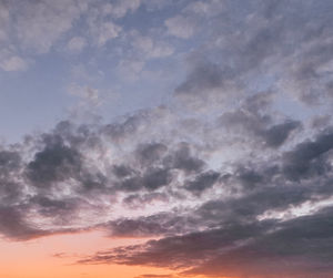 Low angle view of dramatic sky during sunset