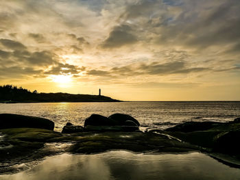 Scenic view of sea against sky during sunset