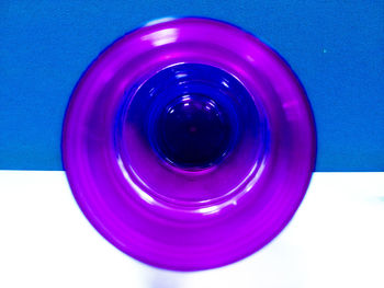 Close-up of multi colored object over black background