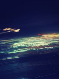 Aerial view of sea against sky at night