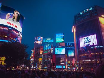 Group of people in city at night