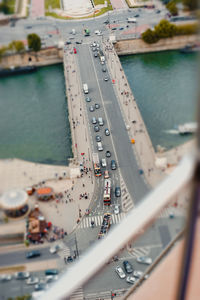 High angle view of vehicles on road in city