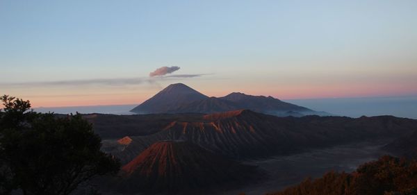 Scenic view of mountains against sky during sunset